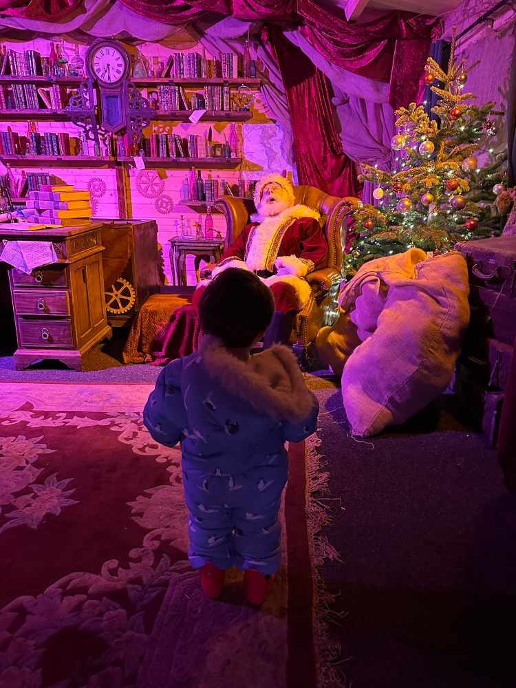 Toddler visiting Santa Claus Christmas